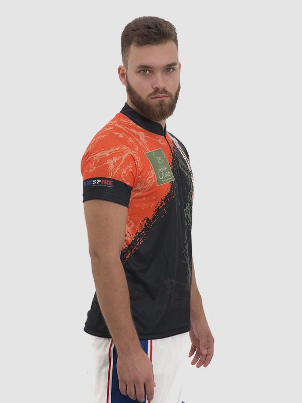 A male model wearing a black and orange handball t-shirt with a black collar hem.