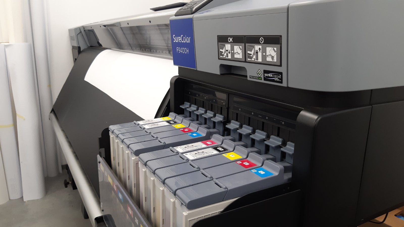 Dye sublimation printer in the clothing factory. The name of this printer is Epson SureColor SC F9400H